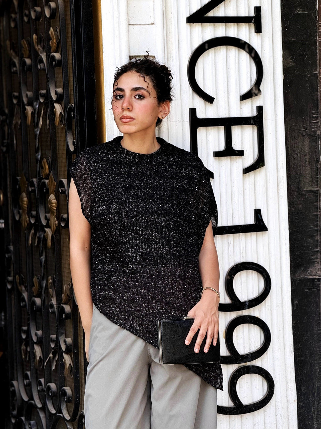 Asymmetric Metallic Black Knit Top